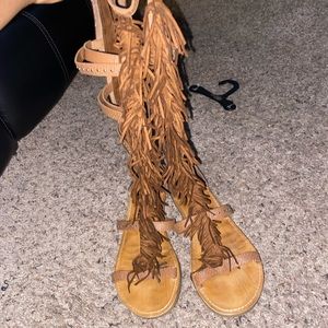 Brown leg sandals